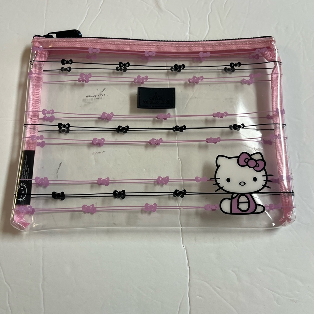 Impressions Hello Kitty Pink and Black Transparent Pouch